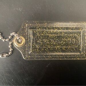 Coach Clear w/gold specks Hang Tag Keychain